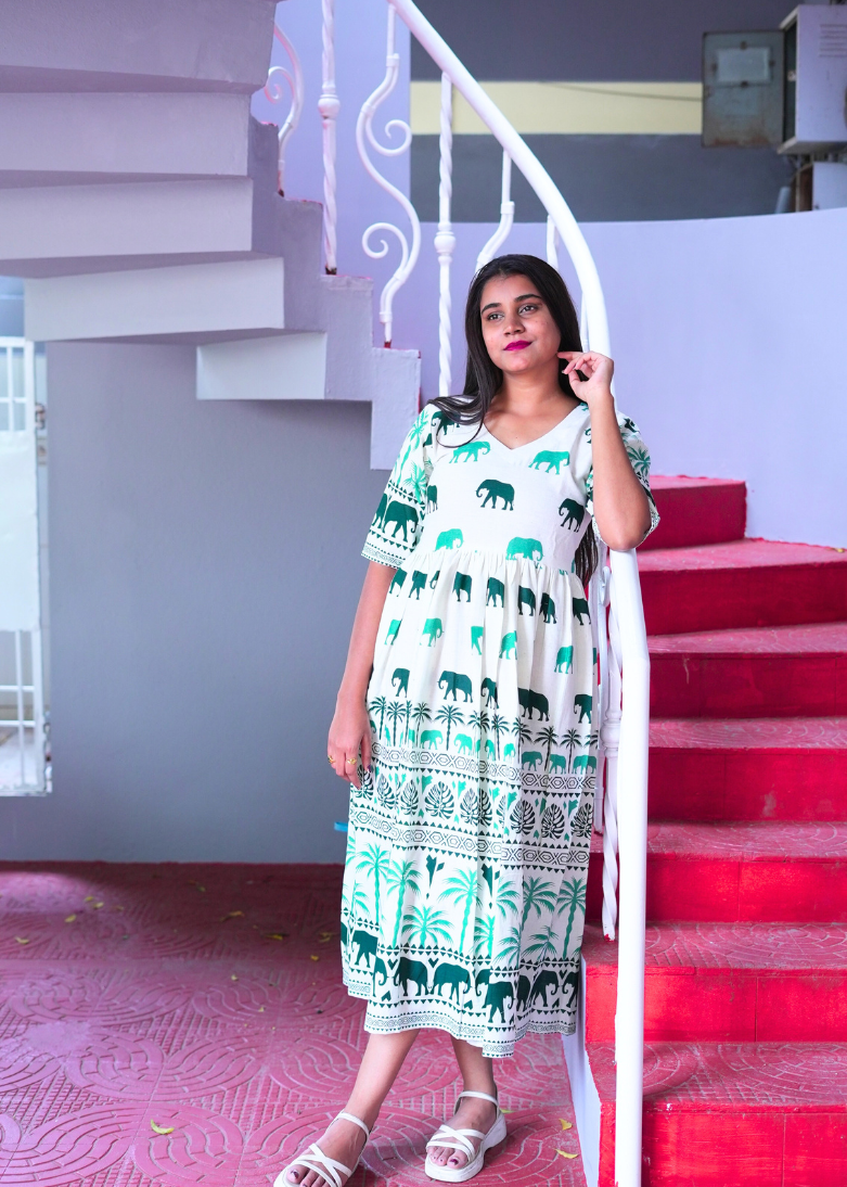 SC203 – Ivory Elephant Print Midi Dress
