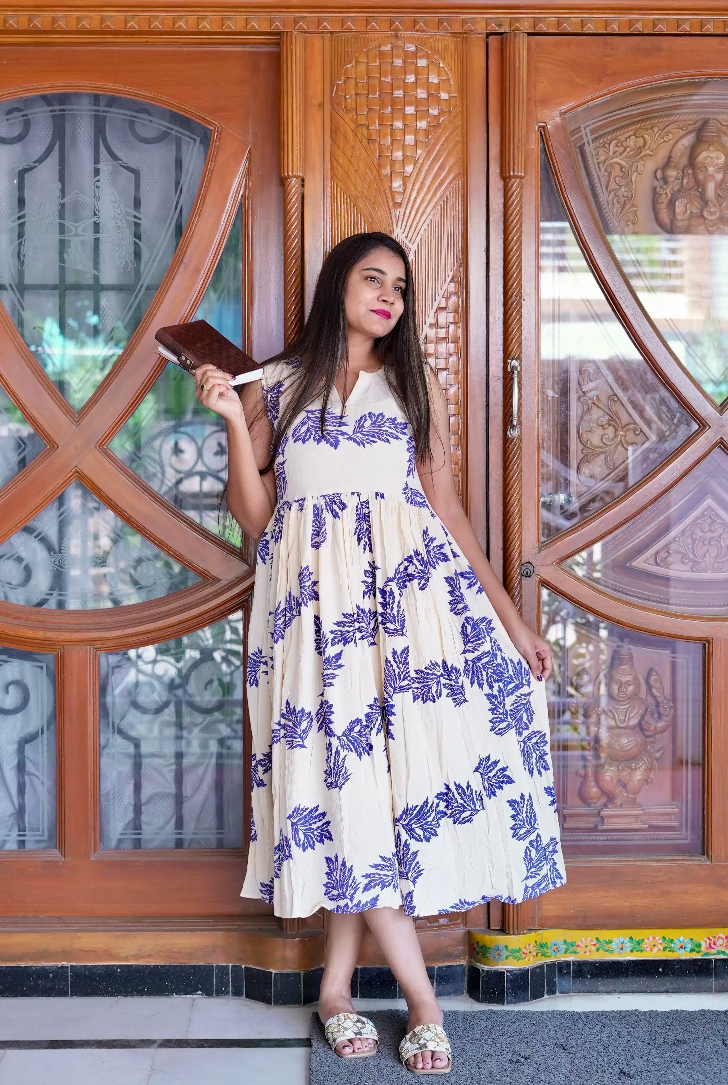 SC209 – Blue Printed Sleeveless Cotton Frock